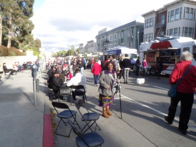 Food trucks alongside the Oakland Museum